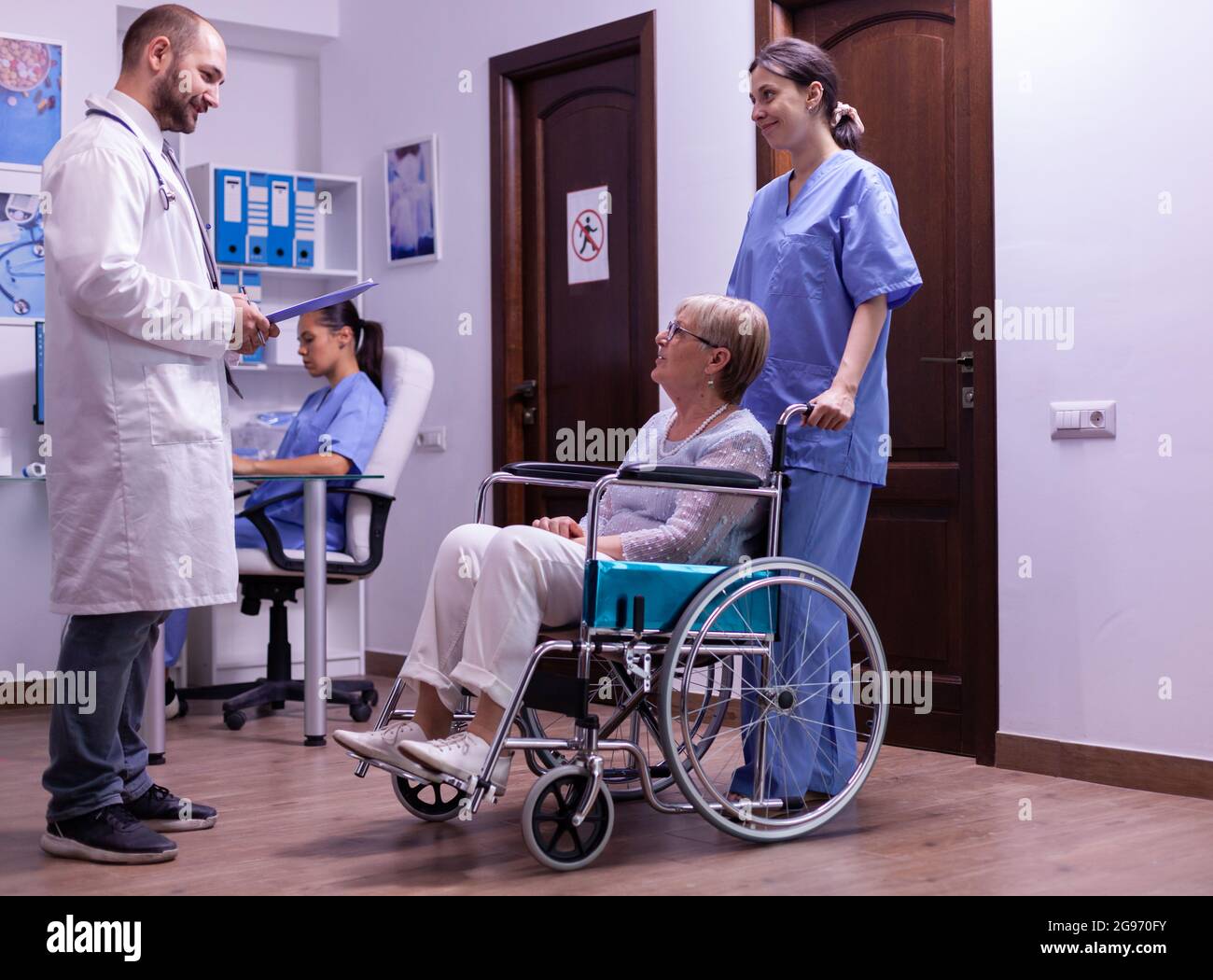 Specialist medic discussing diagnosis and recovery treatment with