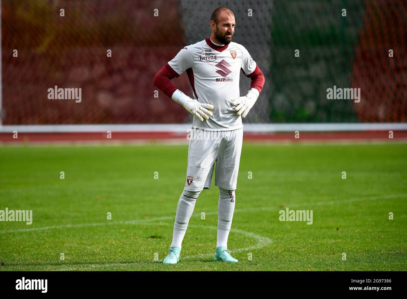 Santa Cristina Gherdeina, Italy. 24 July 2021. Lyanco Vojnovic (R) of Torino  FC competes for the ball with Emanuele Bocchio of SSC Brixen during the  pre-season friendly football match between Torino FC