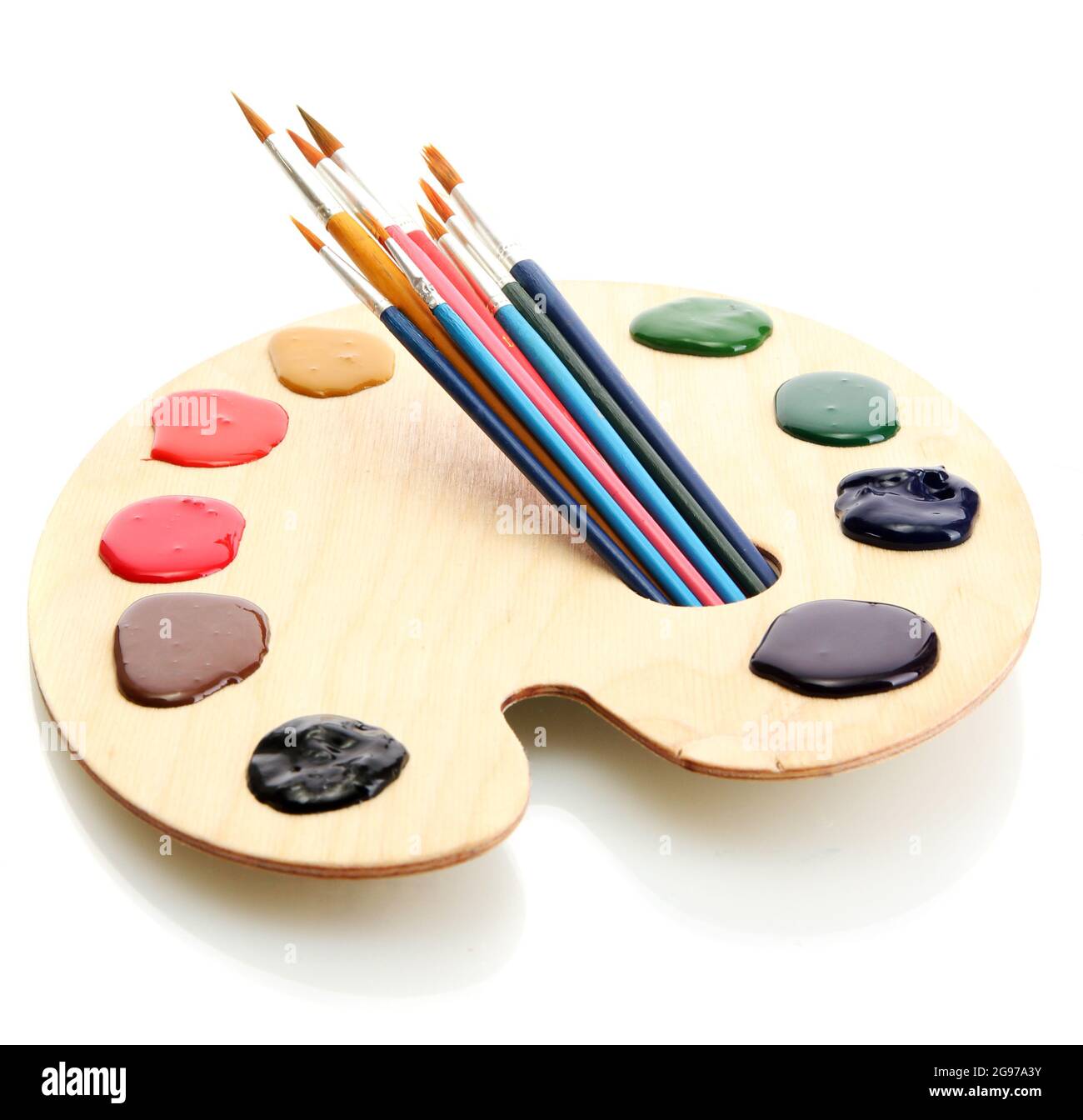 wooden art palette with paint and brushesisolated on white Stock Photo ...