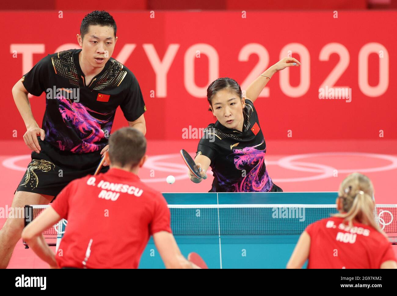 Tokyo, Japan. 25th July, 2021. Xu Xin (L, top)/Liu Shiwen (R, top) of China  compete during table tennis mixed doubles quarterfinal against Ovidiu  Ionescu/Bernadette Szocs of Romania at the Tokyo 2020 Olympic