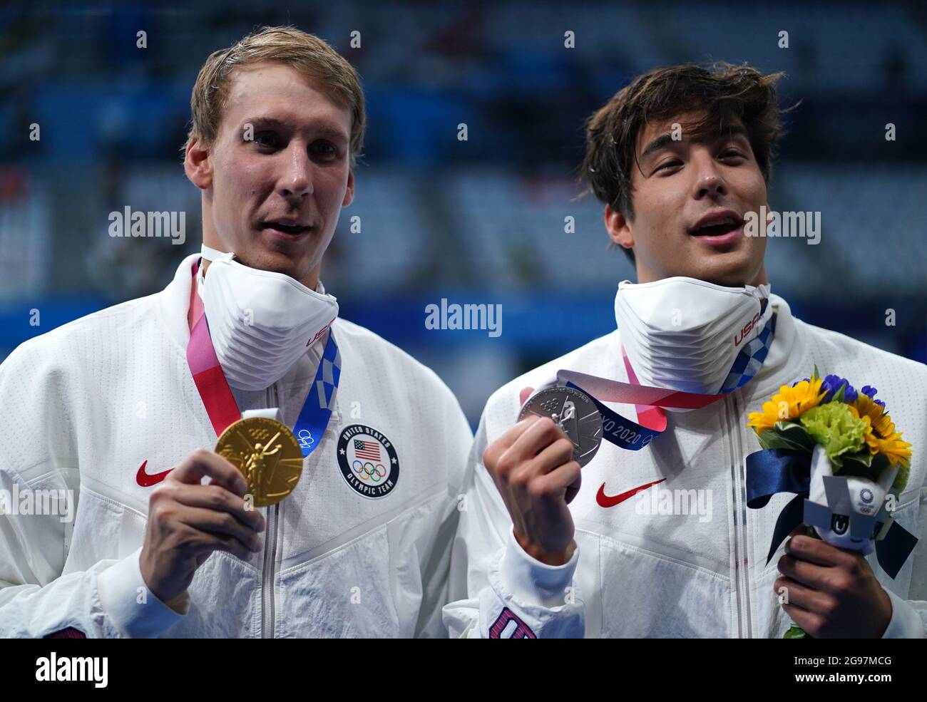USA's Chase Kalisz (left) poses with his gold medal after winning the