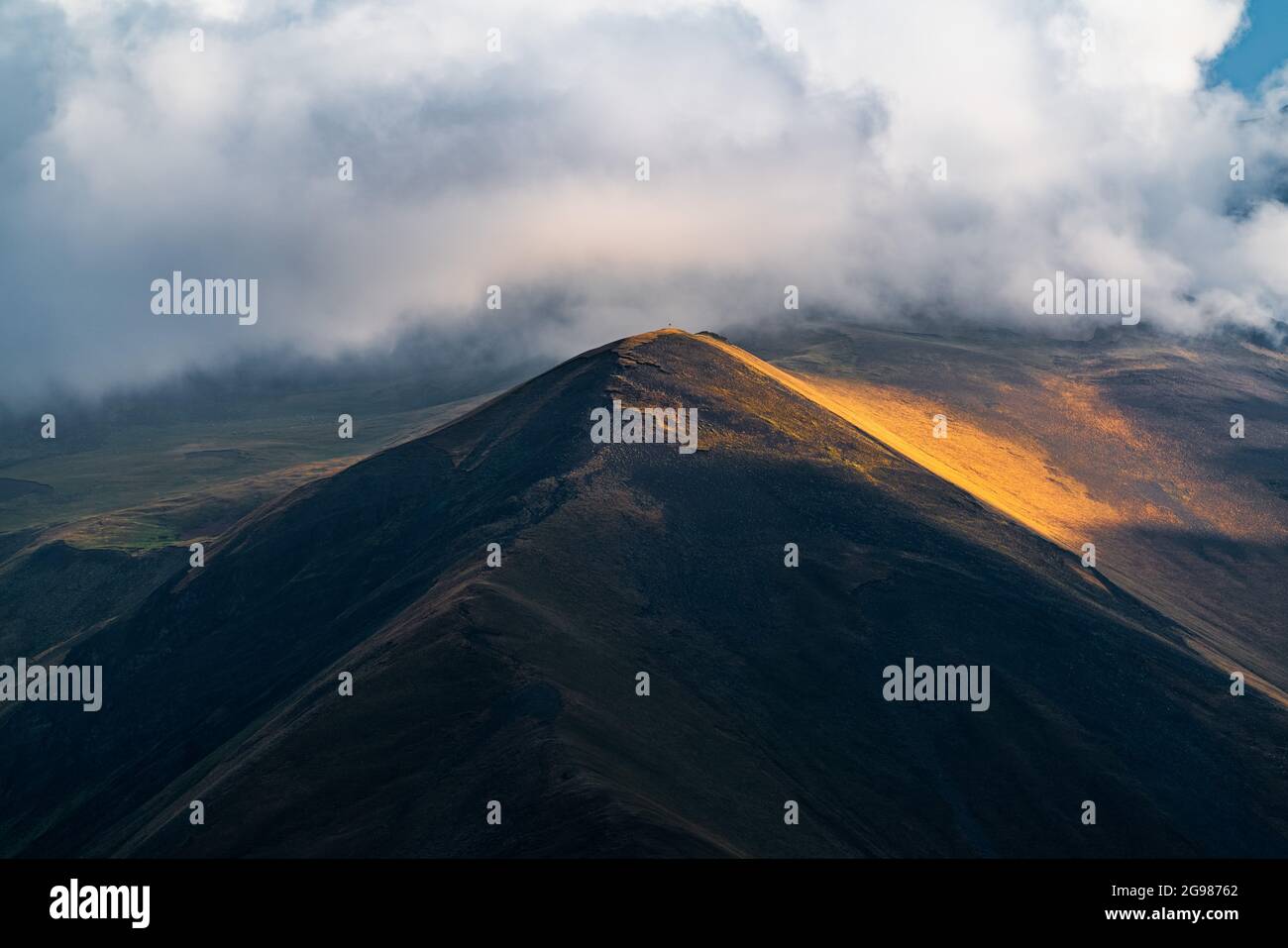 Mountains illuminated by setting sun Stock Photo