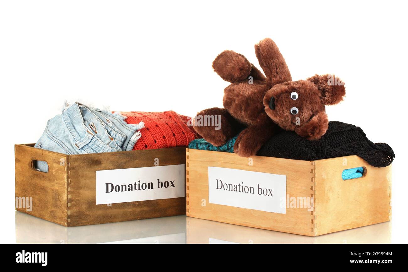 Donation boxes with clothing isolated on white Stock Photo Alamy