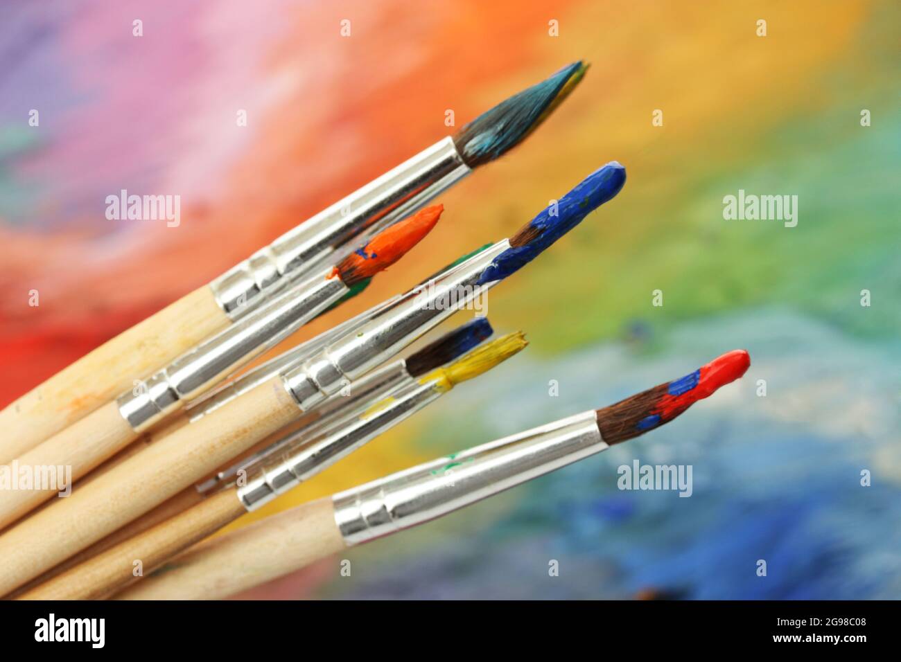 acrylic paint and brushes on wooden palette Stock Photo Alamy