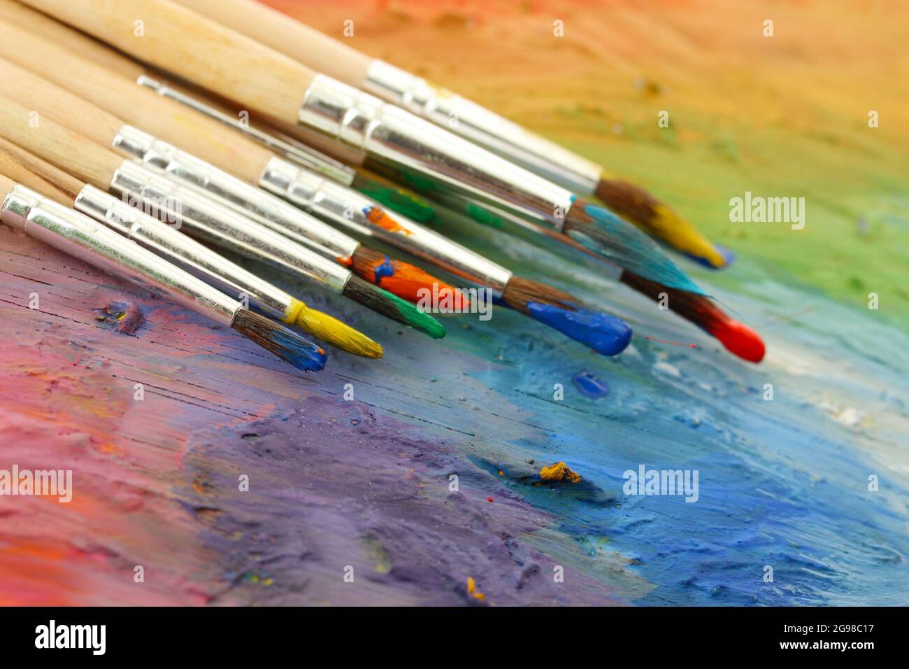 acrylic paint and brushes on wooden palette Stock Photo Alamy