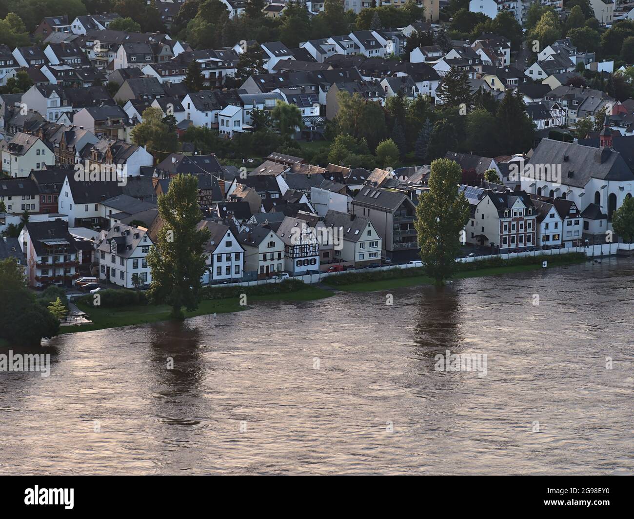 Aerial view of residential buildings in district Neuendorf, part of city Koblenz, Rhineland-Palatinate, Germany on Rhine riverbank with flooded bank. Stock Photo