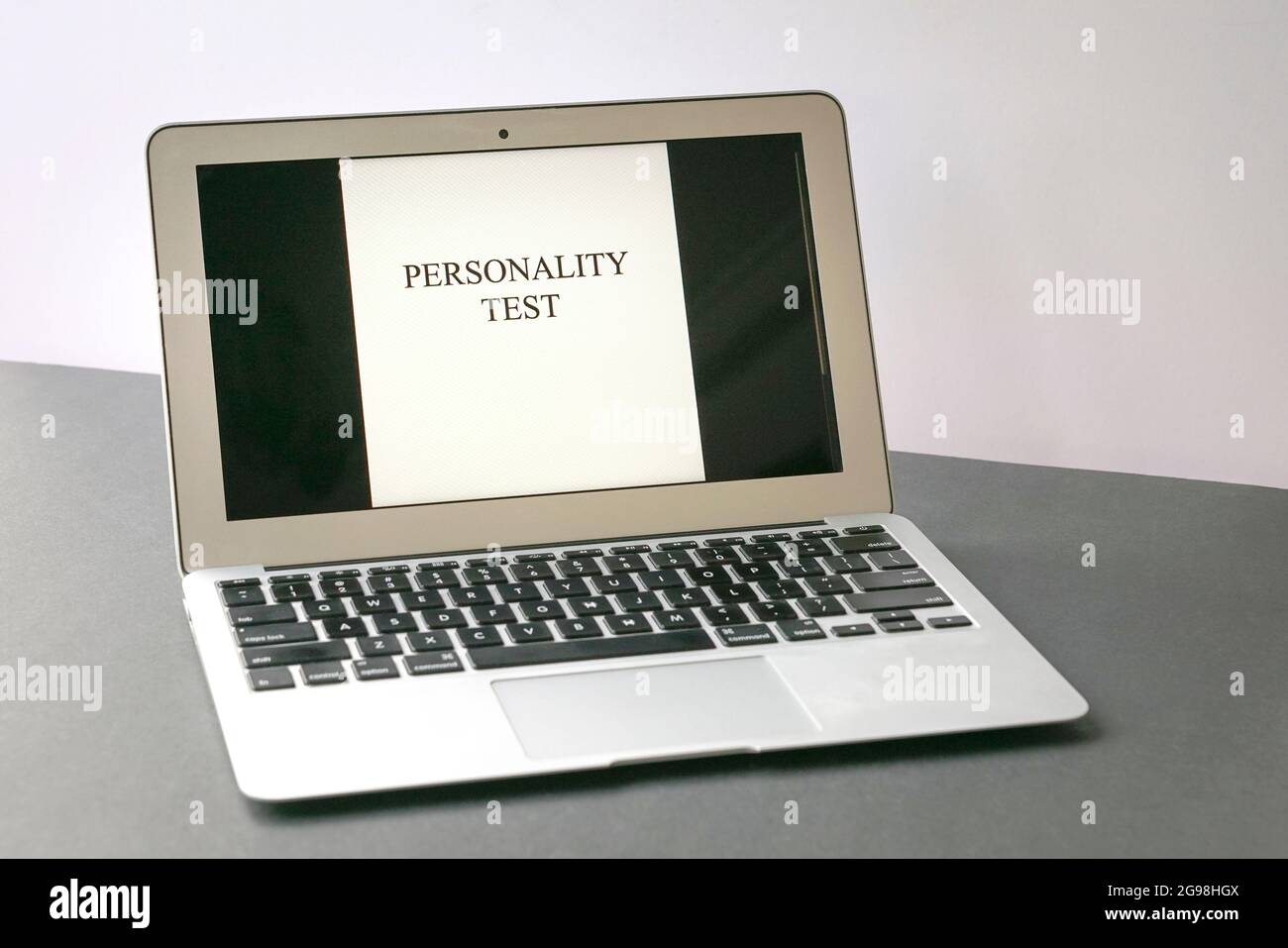 Personality test word displayed on computer desktop screen. Business or career concept. Stock Photo