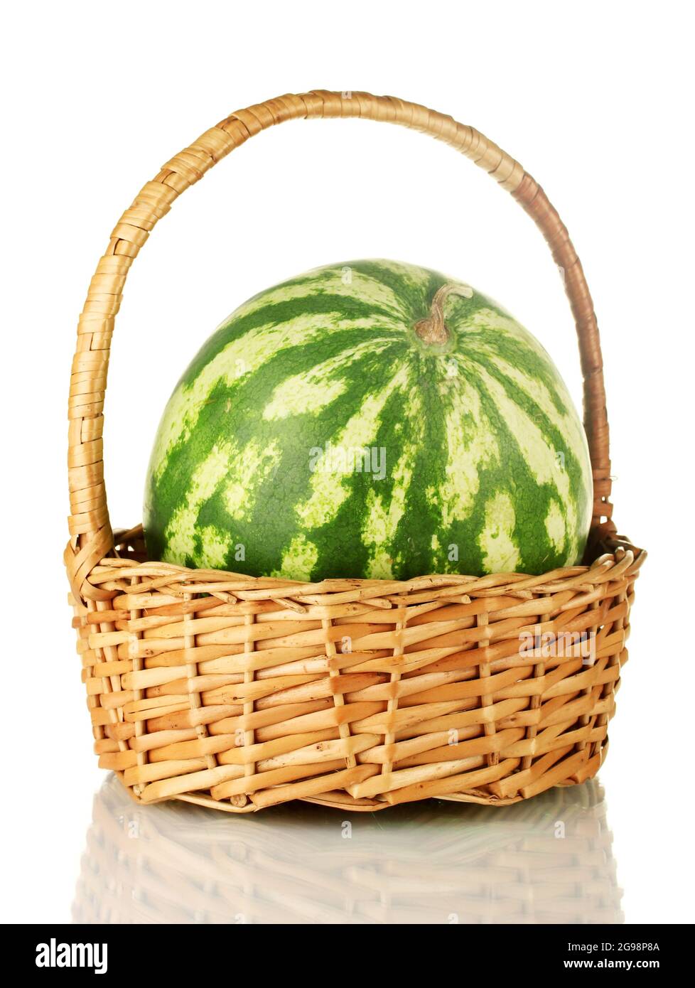 Ripe watermelon in wicker basket isolated on white Stock Photo