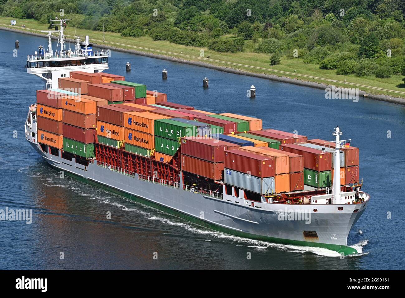 Containership EMILIA passing the Kiel Canal Stock Photo
