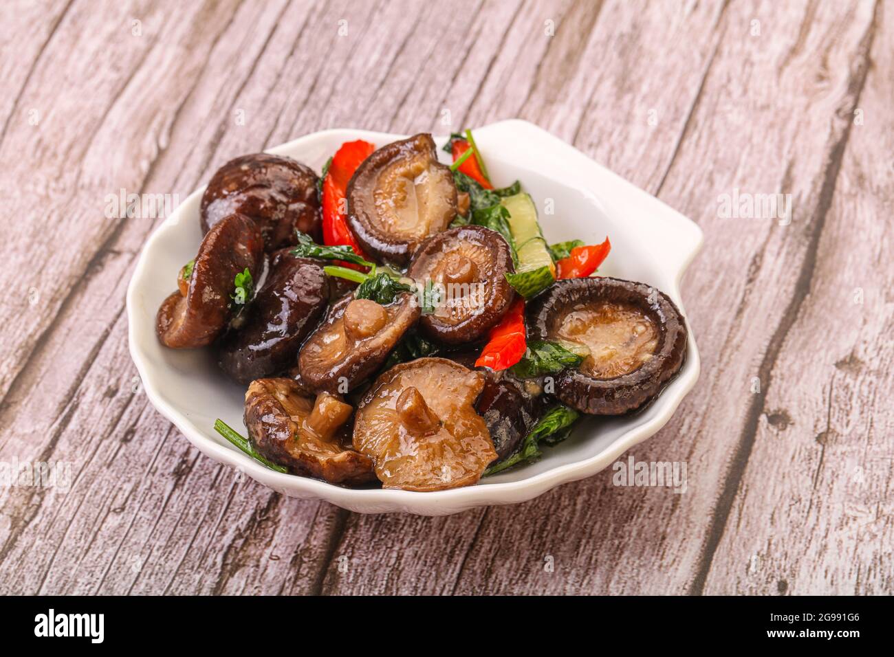 Marinated shiitake mushrooms with herbs and spices Stock Photo Alamy