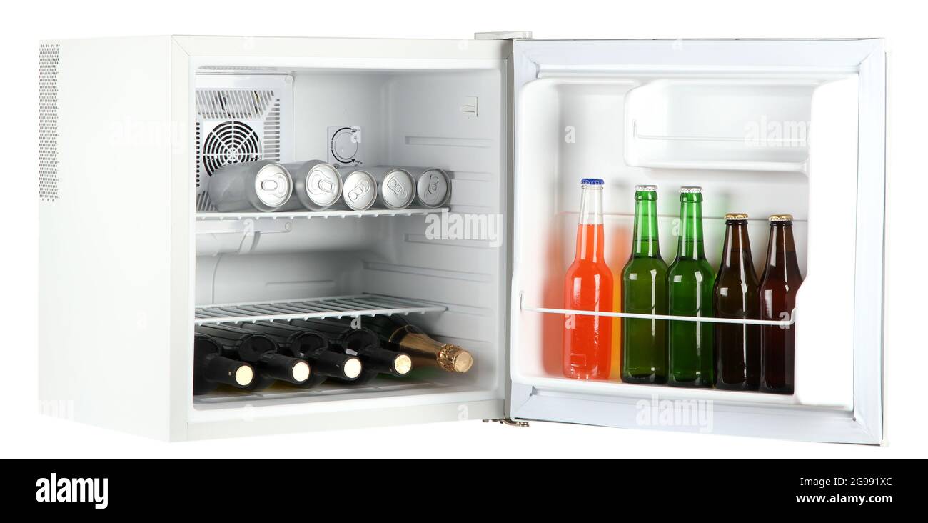 Mini fridge full of bottles of alcoholic beverages isolated on white