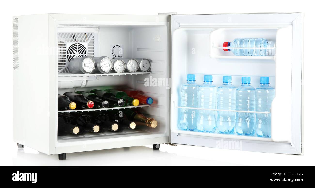 Mini fridge full of bottles of alcoholic beverages and water isolated