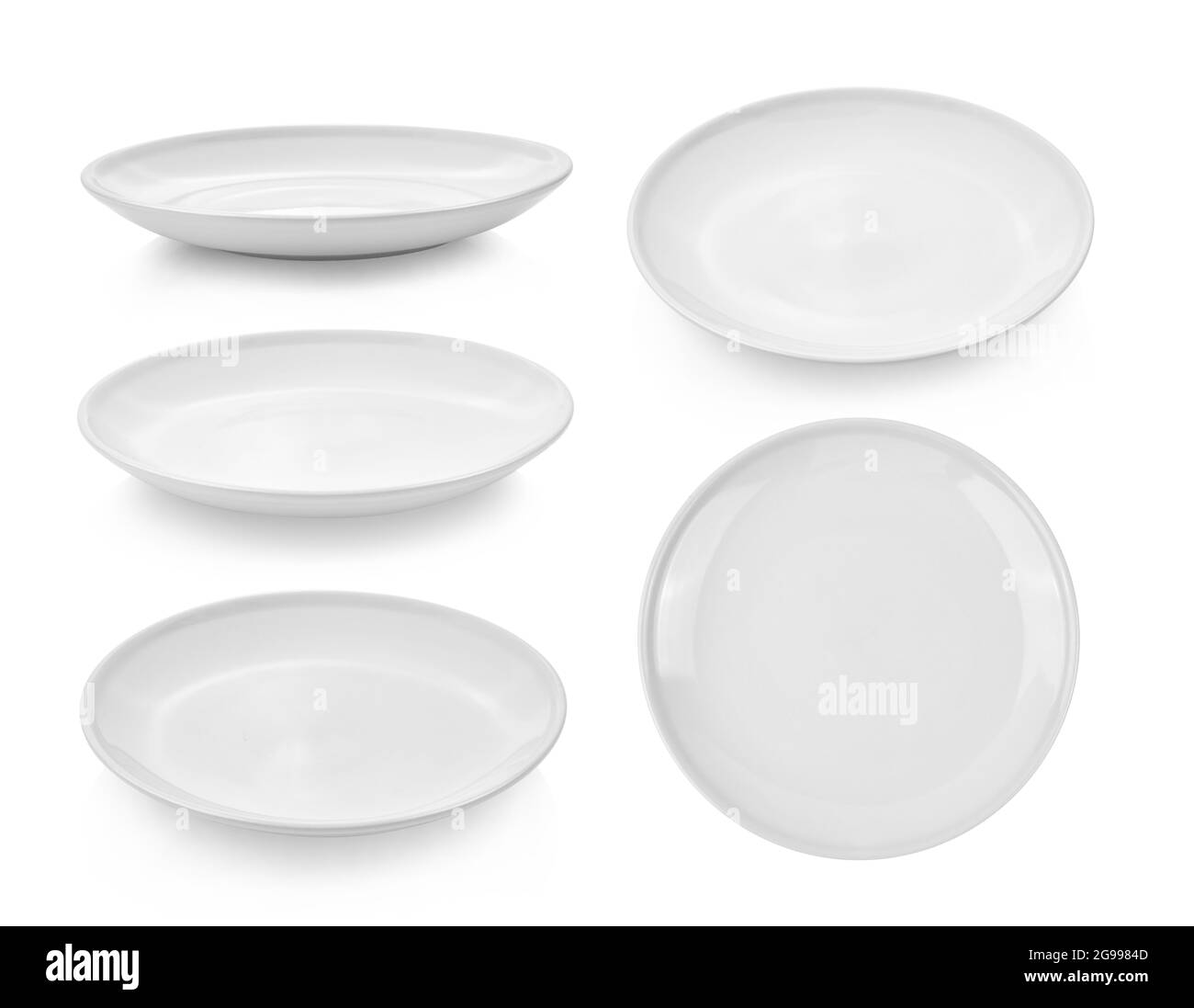 white ceramic plate on white background Stock Photo - Alamy