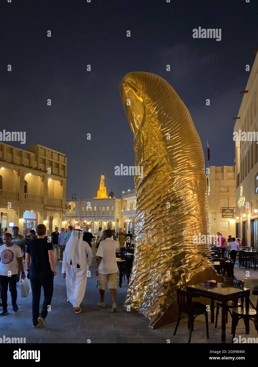 Doha, Qatar September 24, 2019 Golden thumb sculpture at Doha Souq
