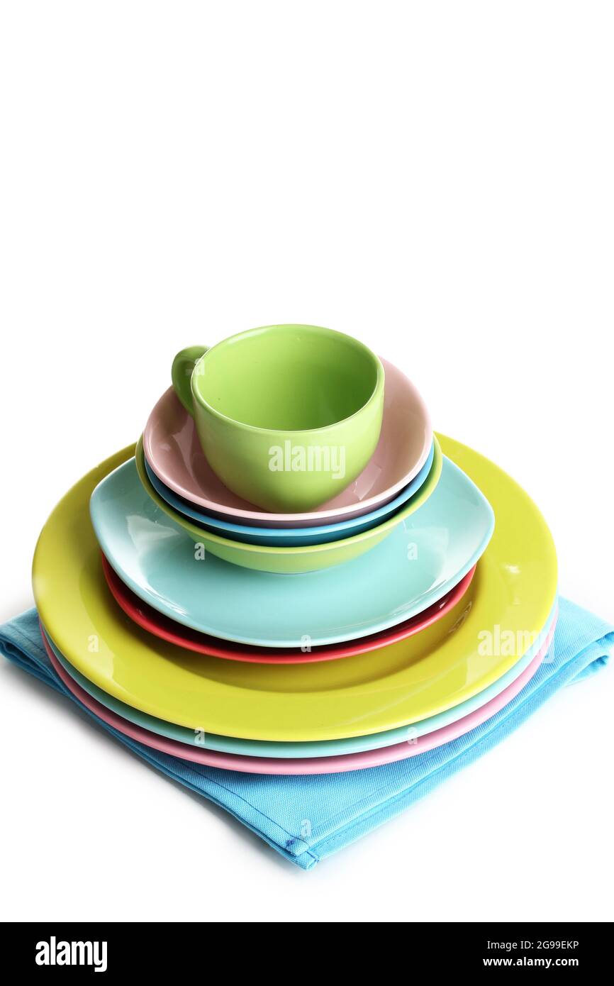 Colorful plates on napkin isolated on white Stock Photo Alamy