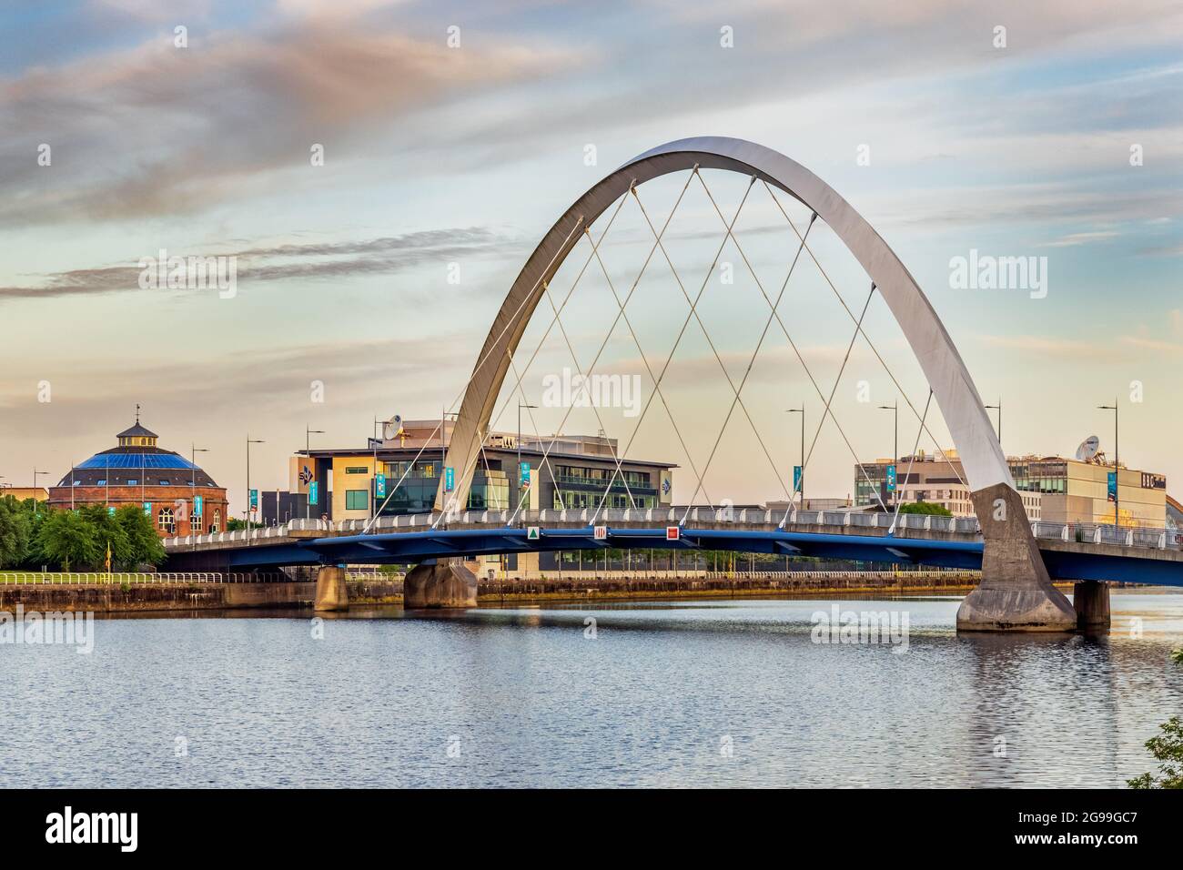 The Squinty Bridge, or real name The Clyde Arc, spanning the river Clyde in Glasgow. Taken just after sunrise. Stock Photo
