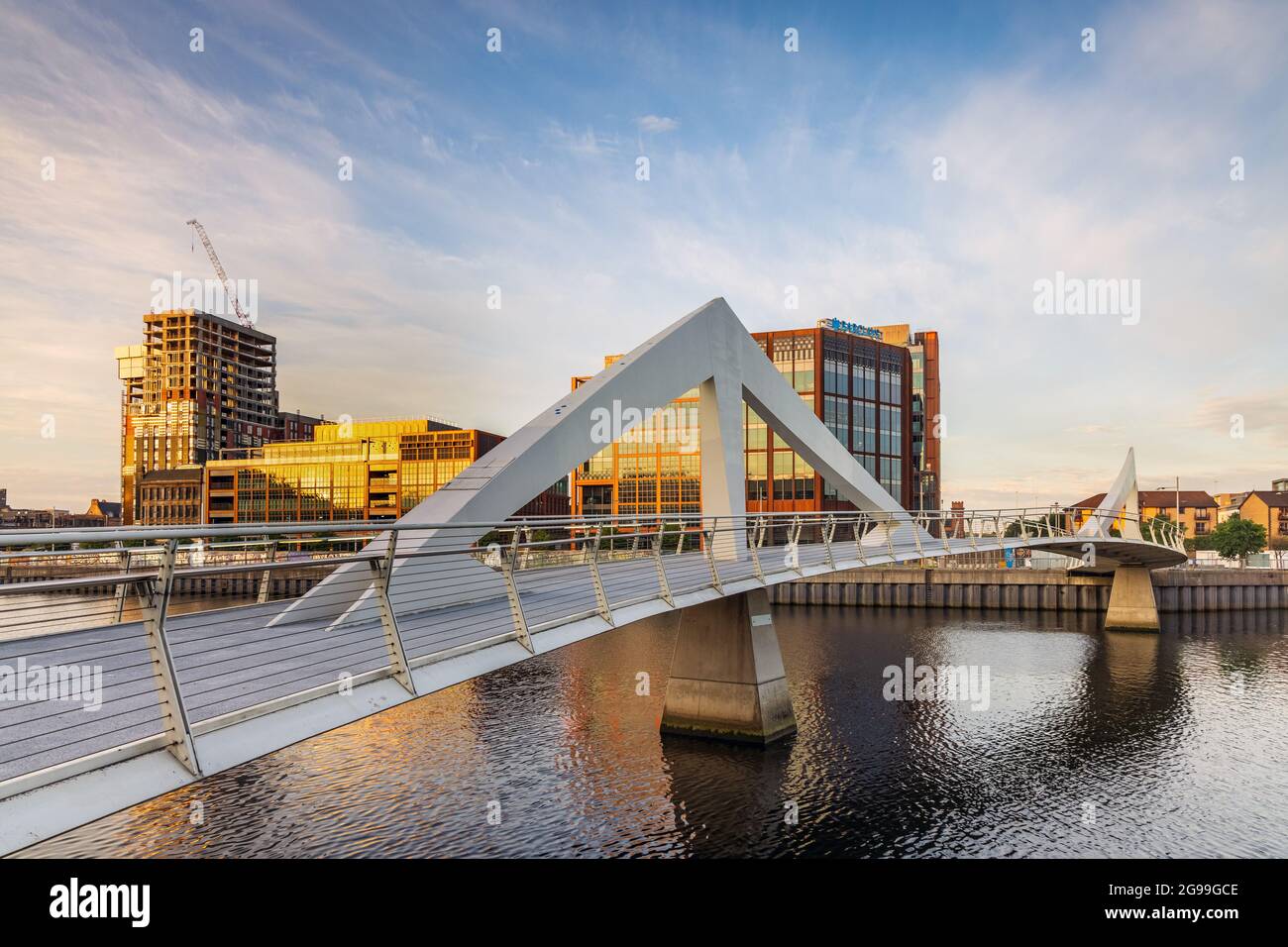 The Squiggly Bridge over the River Clyde in Glasgow, taken at sunrise. Stock Photo