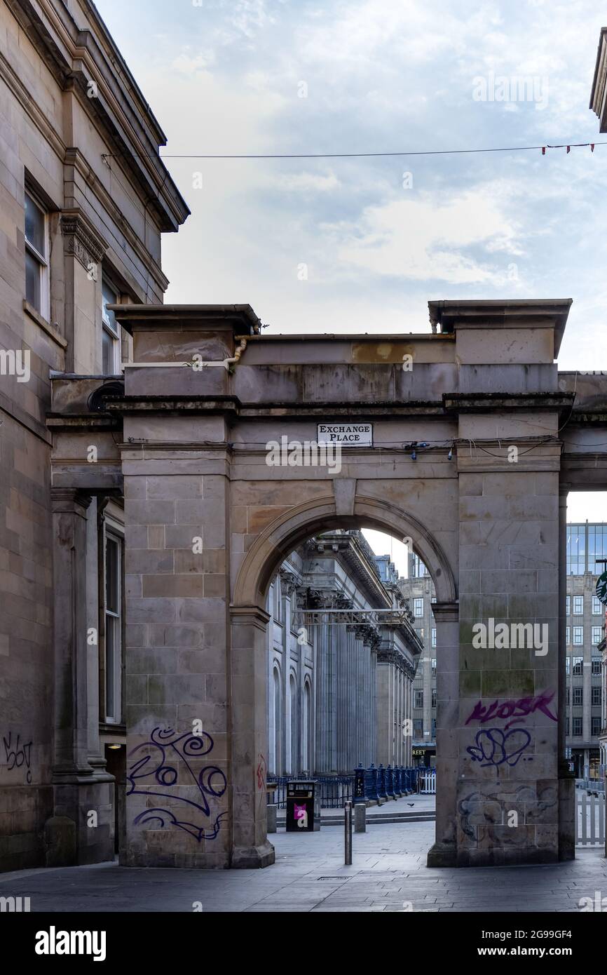 The arched entrance to Merchant City at Royal Exchange Square in Glasgow city centre, Scotland, Uk Stock Photo