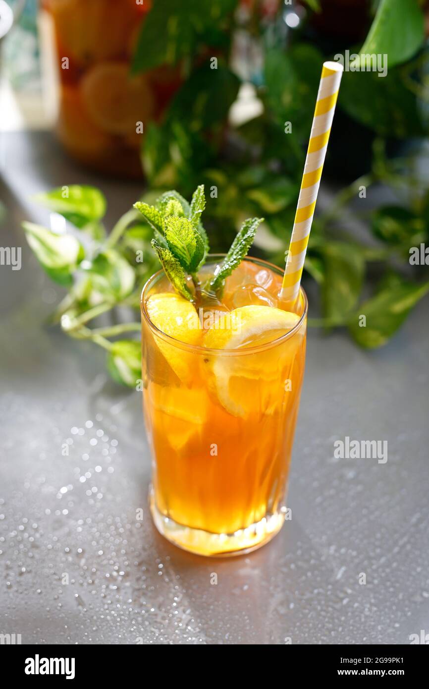 Drink with orange juice and ice. Vodka with orange dock and ice. Refreshing drink, culinary photography. Stock Photo