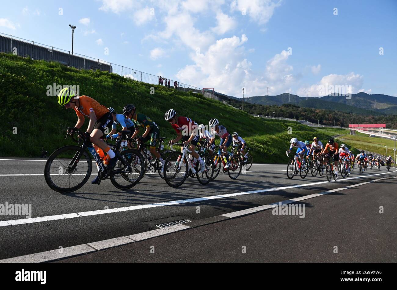 Shizuoka, Japan. 25th July, 2021. Riders compete during the women's cycling road race at the Tokyo 2020 Olympic Games in Shizuoka, Japan, July 25, 2021. Credit: He Changshan/Xinhua/Alamy Live News Stock Photo