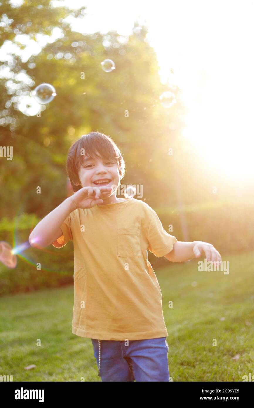 Child playing in the park hi-res stock photography and images - Alamy