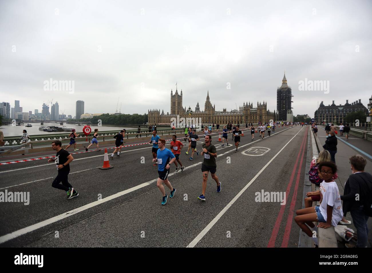 London England UK. 25th July 2021. Runners on Westminster
