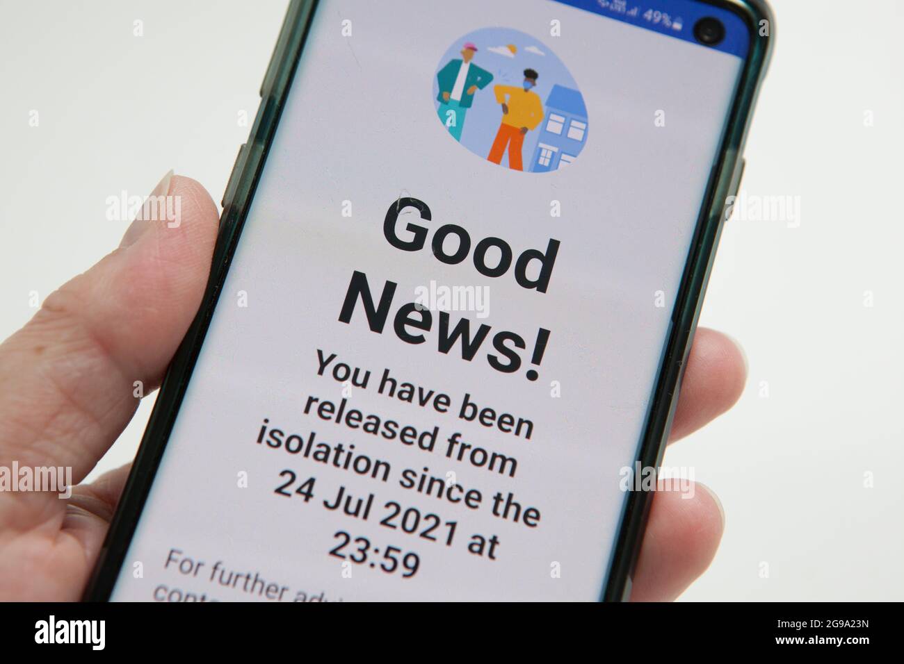 London, UK, 25 July 2021: a mobile phone shows a notification from the NHS Covid app saying that the recipient is released after a 10-day period of self-isolation due to close contact with someone who tested osotive for coronavirus. In the last few days new case numbers have levelled off slightly but the pingdemic reflects the pandemic with high levels of the delta variant spreading and causing disruption in many sectors, particularly transport and food supplies. Anna Watson/Alamy Live News Stock Photo
