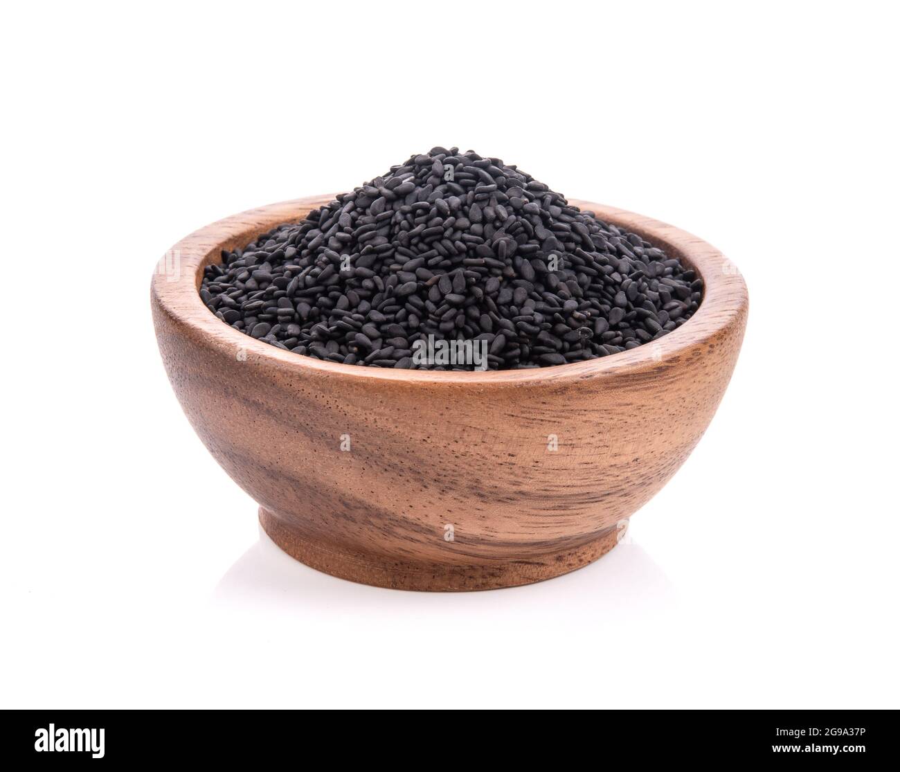 sesame in wood bowl isolated on white background Stock Photo - Alamy