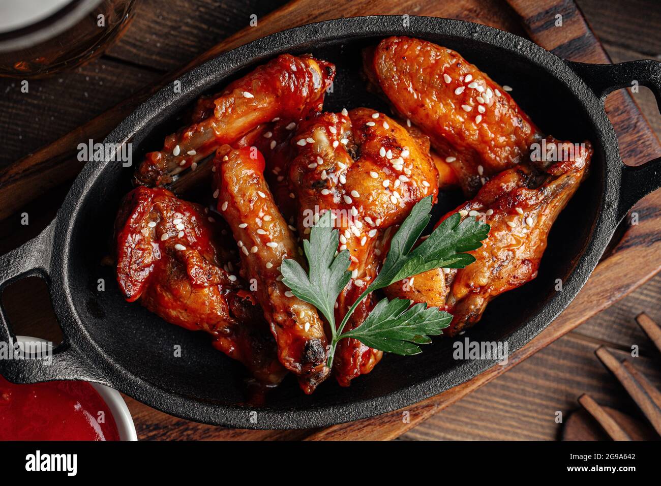 Plate of fried wings in teriyaki sauce Stock Photo