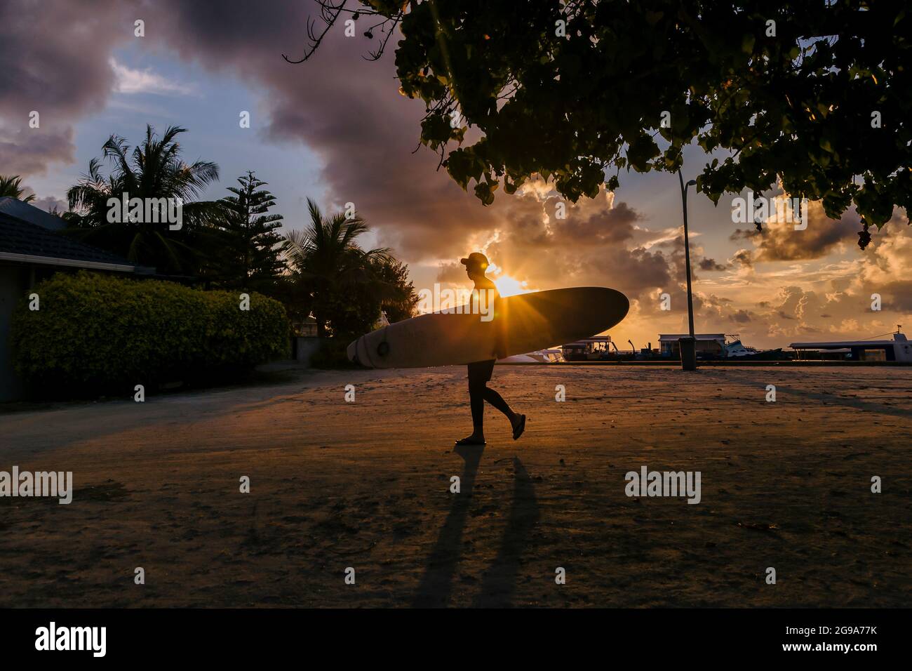 Silhouette male surfer walking hi-res stock photography and images - Alamy