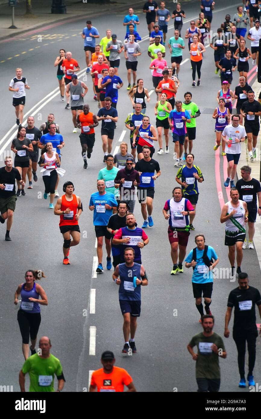 Runners on the Embankment in central London as they take part in the Asics  London 10k, thought to be the largest closed road running event in London  since the March 2020 lockdown.