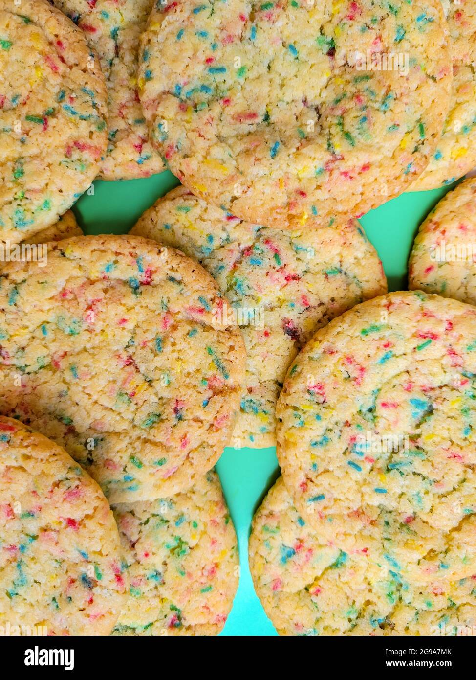 Bright fluffy sprinkle cookies for party, top view, wallpaper Stock