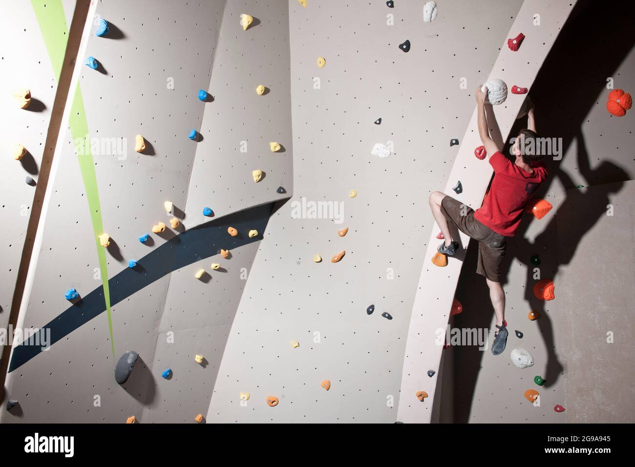 climber bouldering at indoor climbing wall in London Stock Photo Alamy