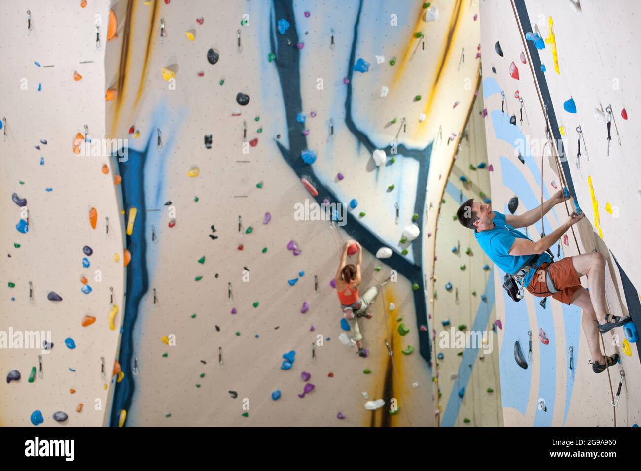 man climbing at indoor climbing wall in London Stock Photo Alamy
