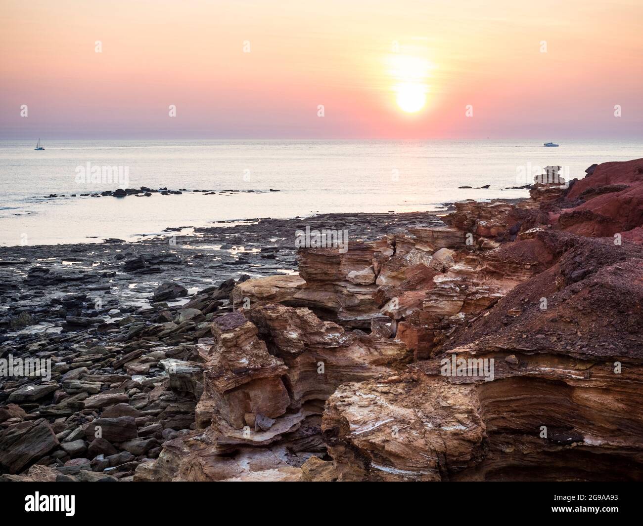 Indian Ocean sunset off rocky Reddell Beach, Broome, Kimberley, Western Australia Stock Photo