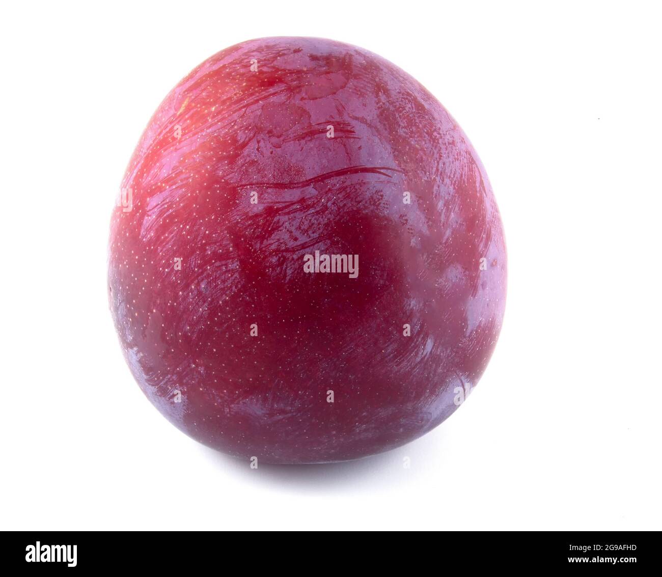Red plum fruit isolated on white background. Stock Photo