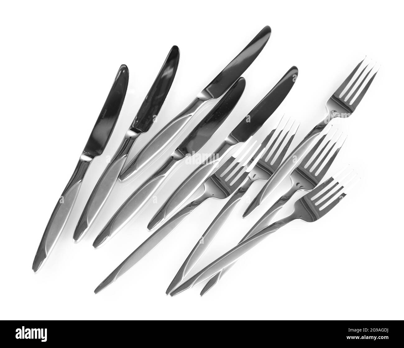 a set of knives and forks isolated on white Stock Photo Alamy
