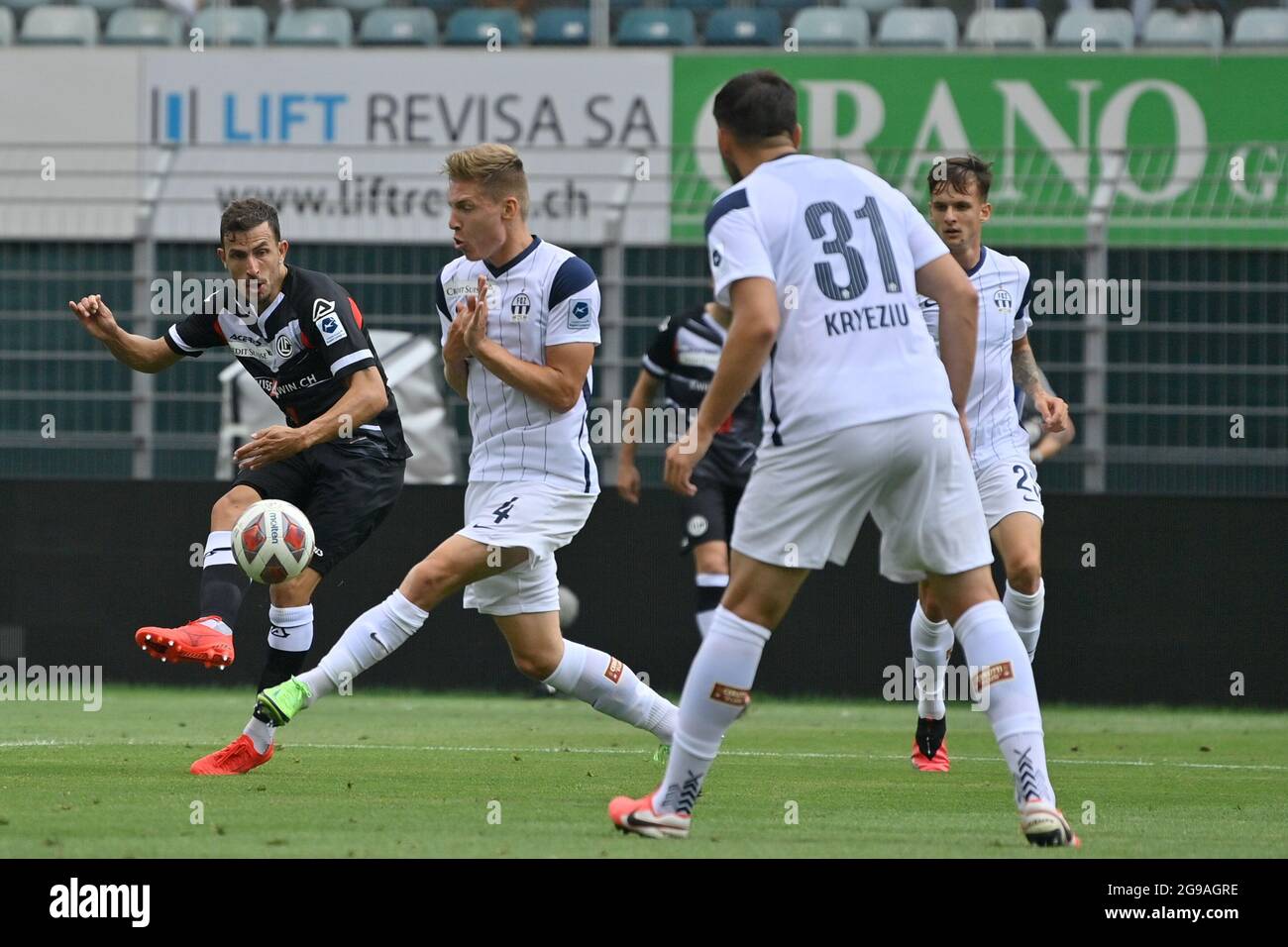 Lugano, Switzerland. 25th July, 2021. Antonio Marchesano (#10 FC Zuerich)  and Sandi Lovric (#24 FC Lugano) during the Super League match between FC  Lugano and FC Zuerich at Cornaredo Stadium in Lugano