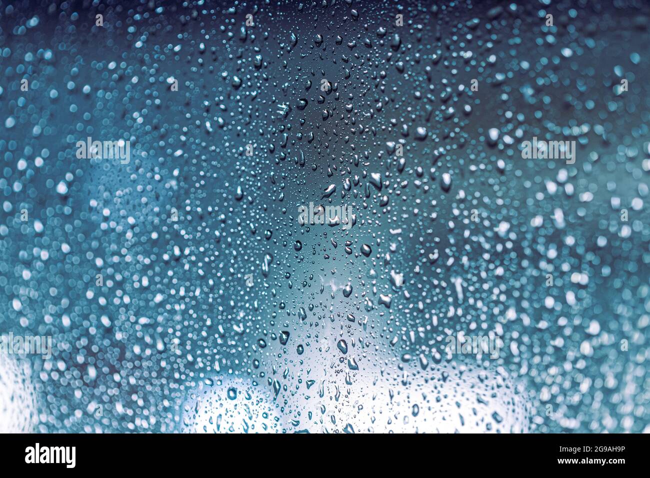 Raining drops in lights on hi-res stock photography and images - Alamy