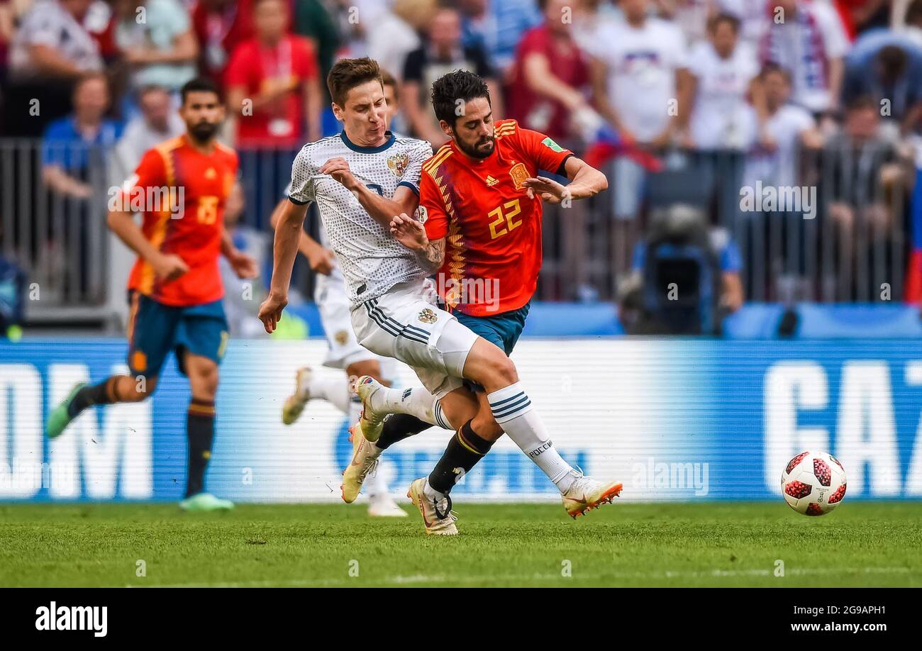 Moscow, Russia - July 1, 2018. Spain national football team midfielder Isco against Russia midfielder Daler Kuzyaev during FIFA World Cup 2018 Round o Stock Photo