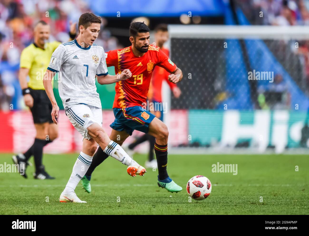Moscow, Russia - July 1, 2018. Russia national football team midfielder Daler Kuzyaev against Spain striker Diego Costa during FIFA World Cup 2018 Rou Stock Photo