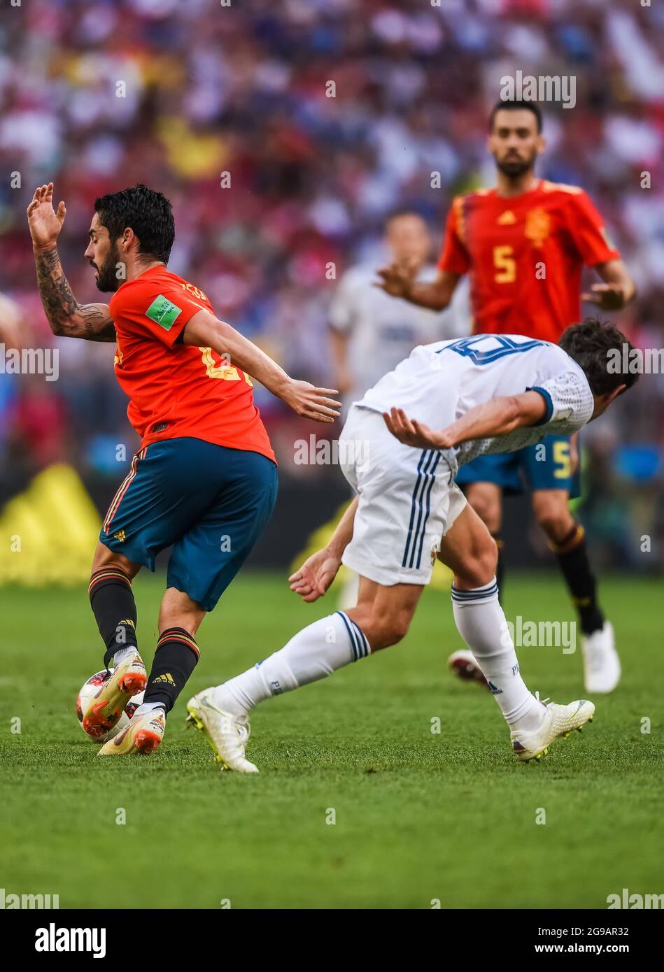 Moscow, Russia – July 1, 2018. Spain national football team midfielder Isco and Russia midfielder Yury Zhirkov during FIFA World Cup 2018 Round of 16 Stock Photo