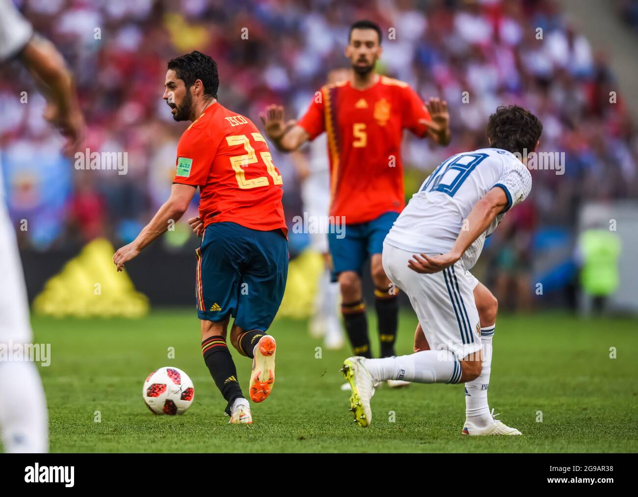 Moscow, Russia – July 1, 2018. Spain national football team midfielder Isco and Russia midfielder Yury Zhirkov during FIFA World Cup 2018 Round of 16 Stock Photo