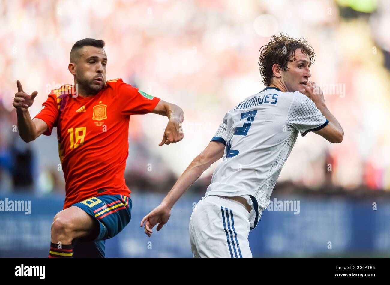 Moscow, Russia - July 1, 2018. Russia national football team defender Mario Fernandes and Spain left-back Jordi Alba during FIFA World Cup 2018 Round Stock Photo