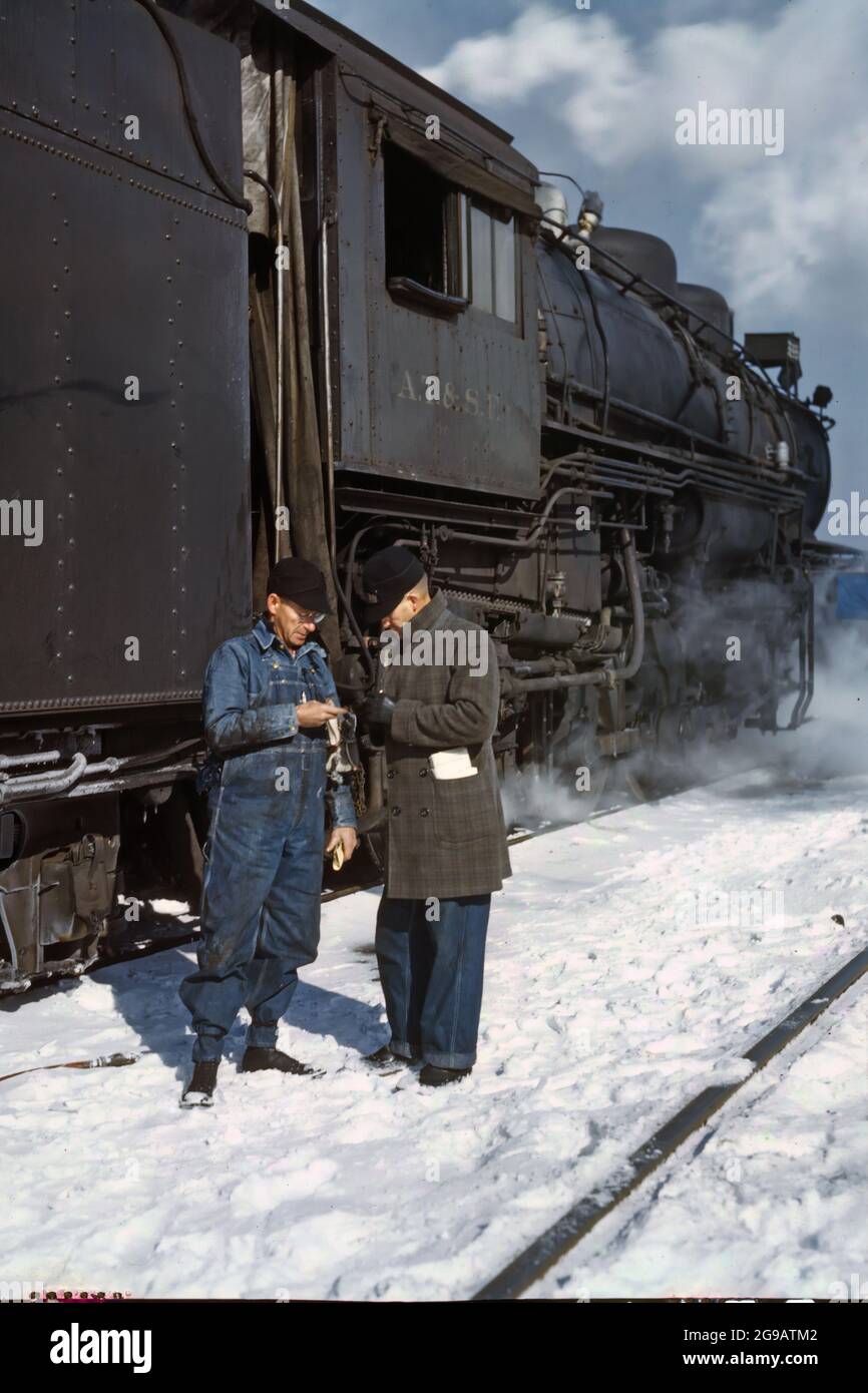 AT&SFRR engineer JW Edwards comparing time with George E Burton at Conwith  yard before proceeding to Chilcothe Illinois 1939 Stock Photo - Alamy