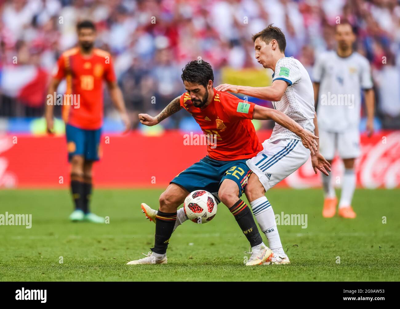 Moscow, Russia - July 1, 2018. Spain national football team midfielder Isco against Russia midfielder Daler Kuzyaev during FIFA World Cup 2018 Round o Stock Photo