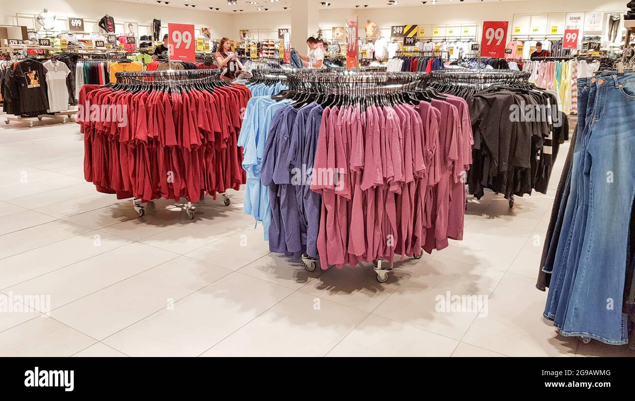 https://c8.alamy.com/comp/2G9AWMG/ukraine-kiev-september-04-2019-a-large-clothing-store-mannequins-and-many-rows-with-hangers-a-variety-of-sizes-and-colors-black-friday-a-day-2G9AWMG.jpg