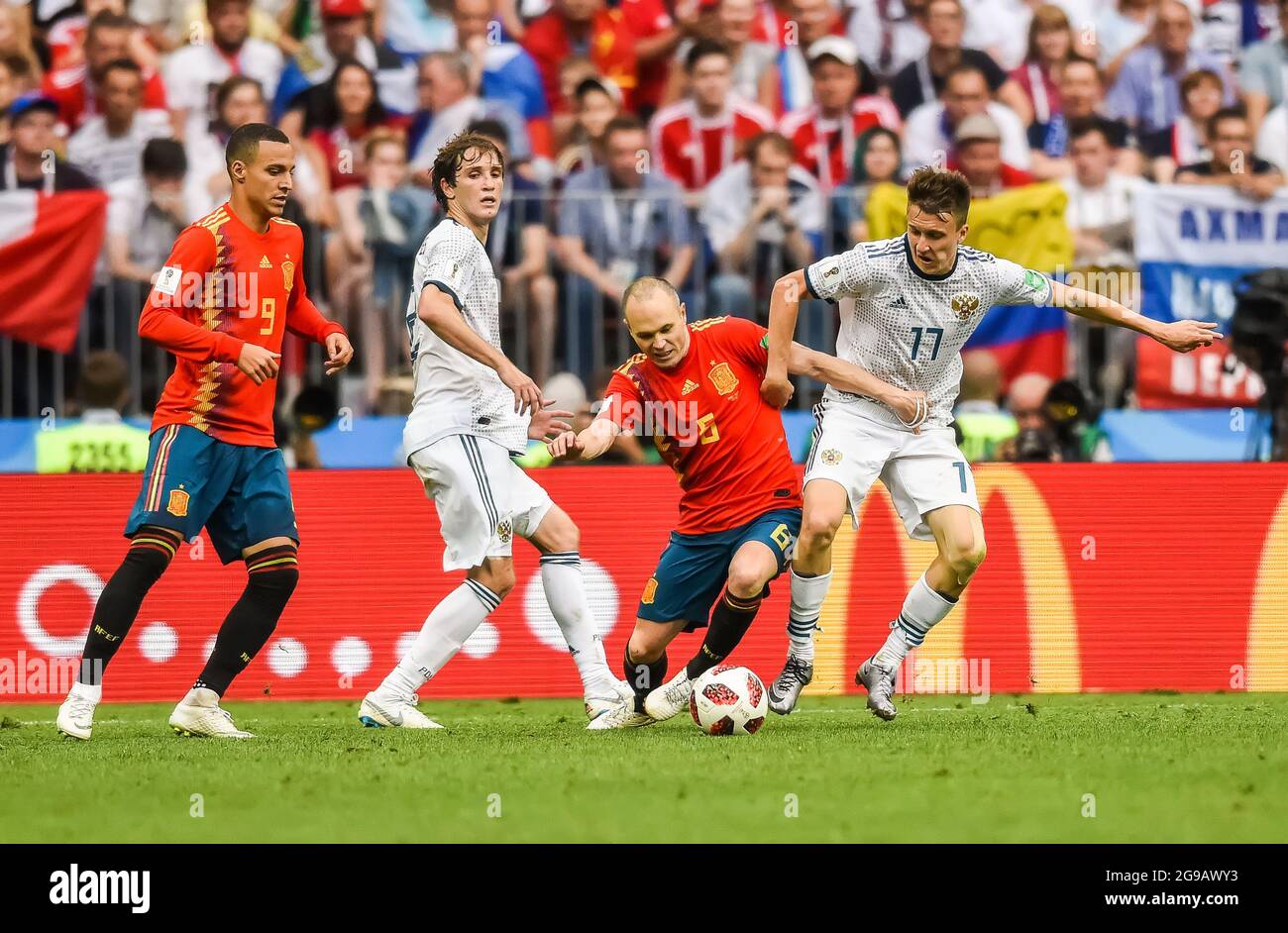Moscow, Russia - July 1, 2018. Players Rodrigo, Mario Fernandes, Andres Iniesta and Aleksandr Golovin during FIFA World Cup 2018 Round of 16 match Spa Stock Photo
