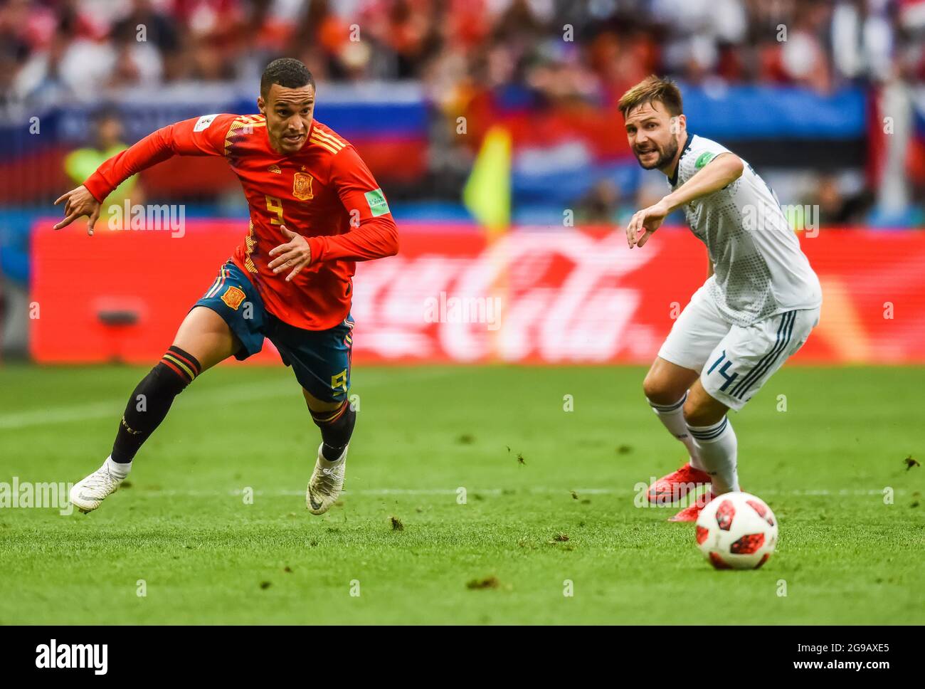 Moscow, Russia - July 1, 2018. Spain national football team winger Rodrigo and Russia midfielder Vladimir Granat during FIFA World Cup 2018 Round of 1 Stock Photo