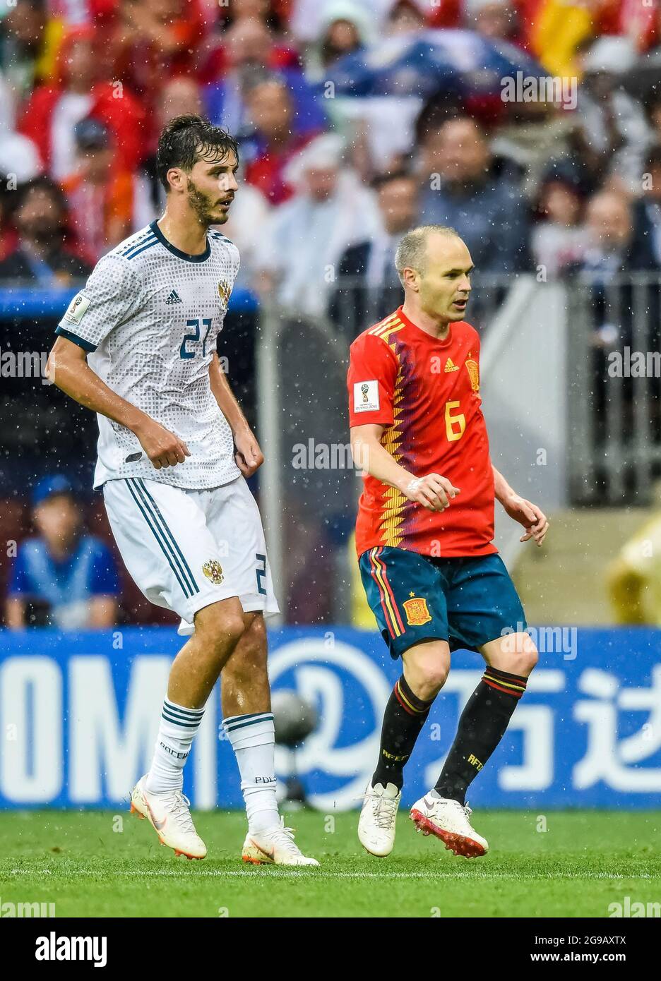 Moscow, Russia - July 1, 2018. Russia national football team defender Ilya Kutepov against Spain midfielder Andres Iniesta during FIFA World Cup 2018 Stock Photo